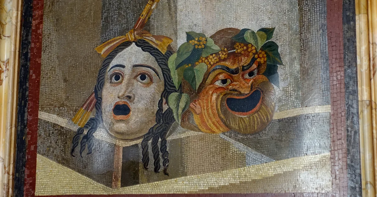 A Roman mosaic of two theatrical masks, one tragic and one comic, crowned with ivy